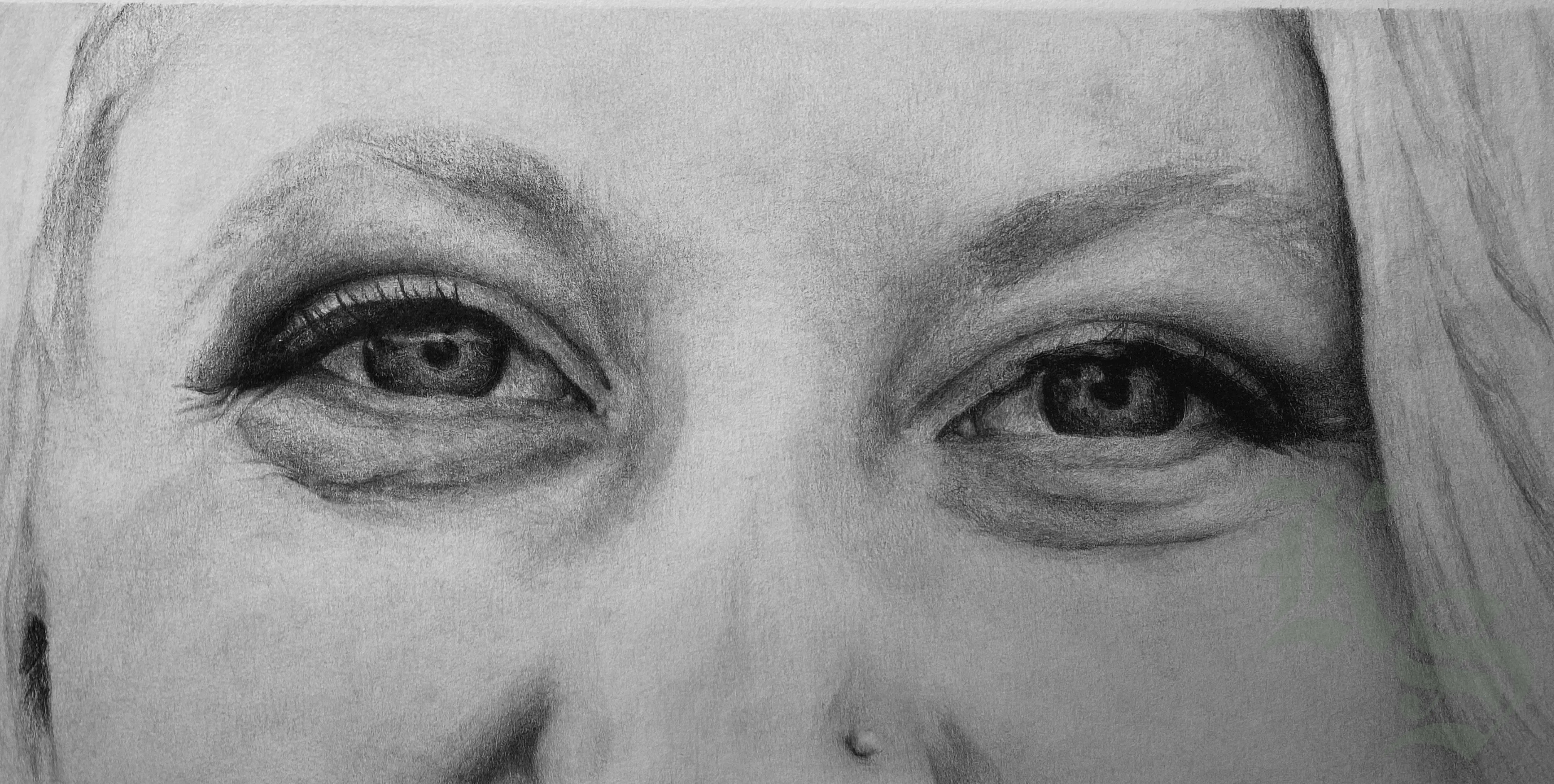 Tightly cropped graphite portrait of a woman’s eyes, holding the creases and smile lines gathered at their corners.