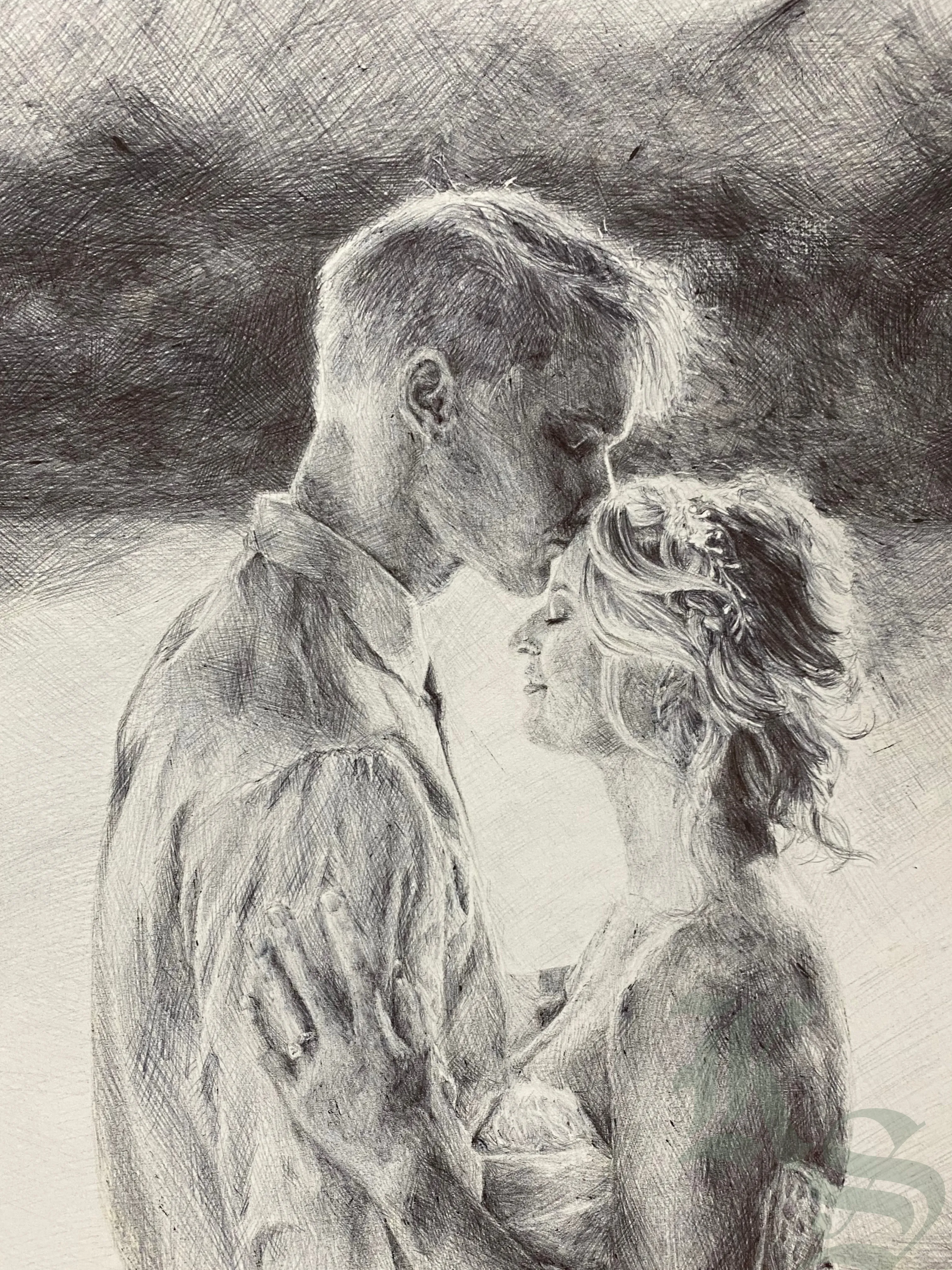 Graphite wedding portrait of a couple holding each other close, the groom kissing the bride’s forehead, her hair pinned with small flowers.